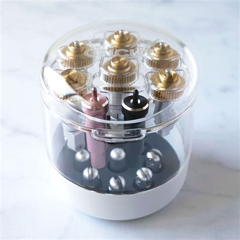 Cricut Machine Tool Organizer; Keeps tips and housings organized, safe, and ready to use; Holds up to 10 Cricut tool housings and 9 QuickSwap™ tips (sold separately); Upper compartment holds Cricut housings and tools; Lower compartment holds QuickSwap tips with or without protective caps; See every tool clearly with clear plastic casing